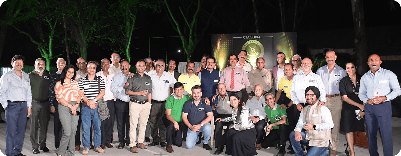 Professionals networking at an outdoor conclave venue